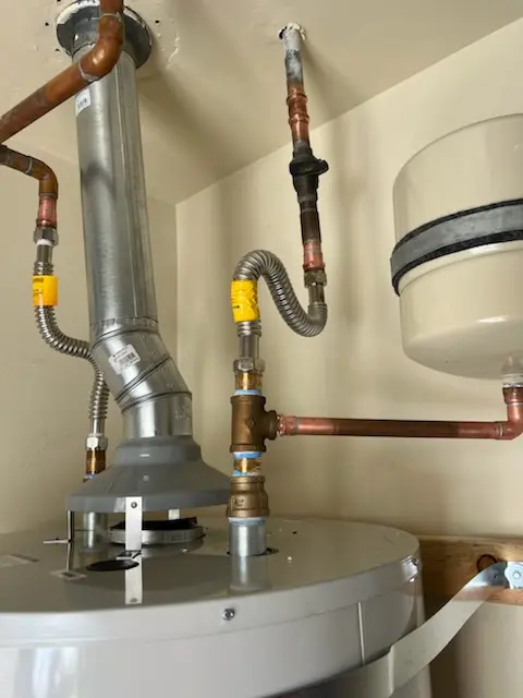 Water heater installation and plumbing repair in Oxboro